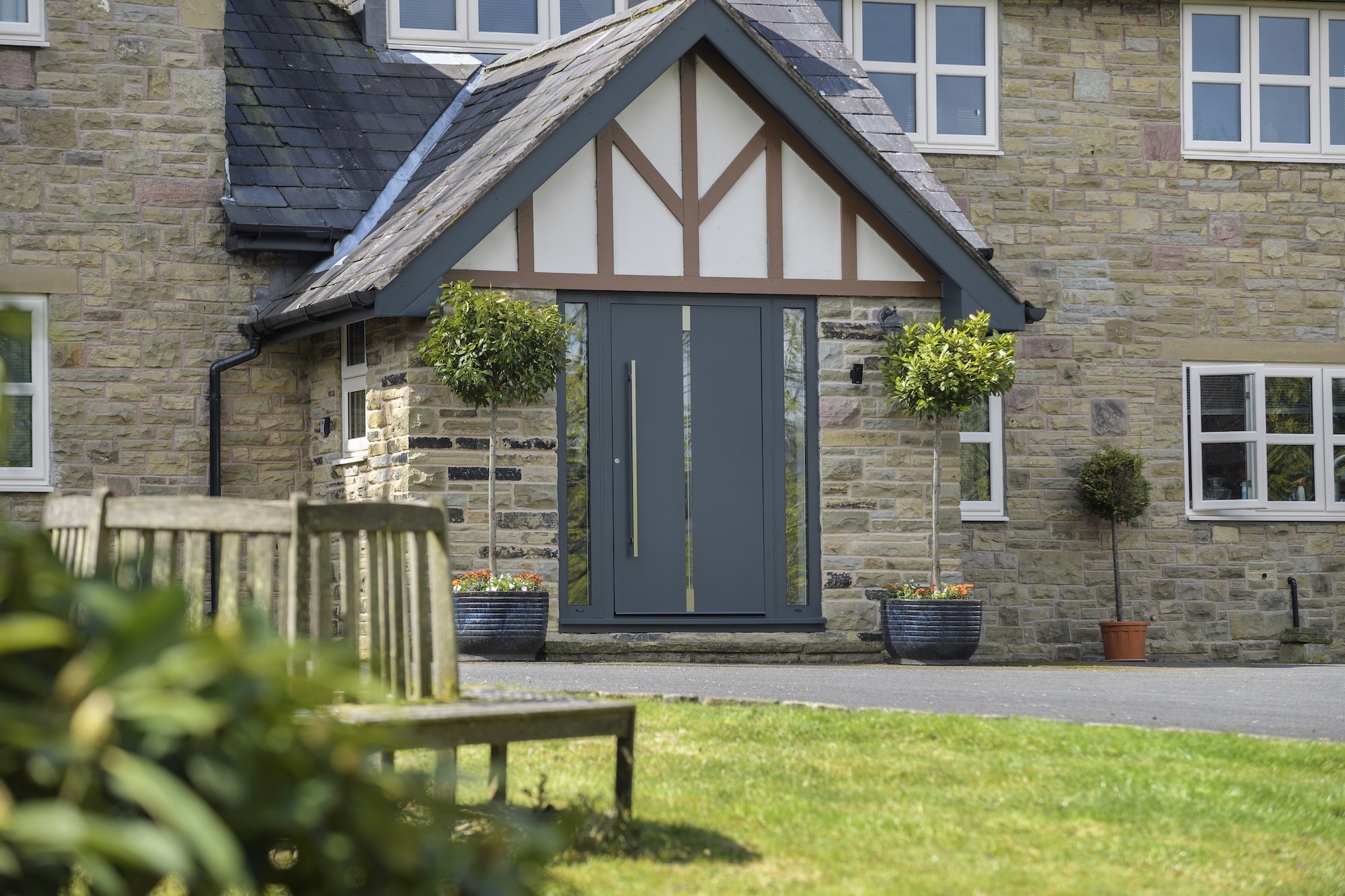 aluminium grey front doors in a double door design