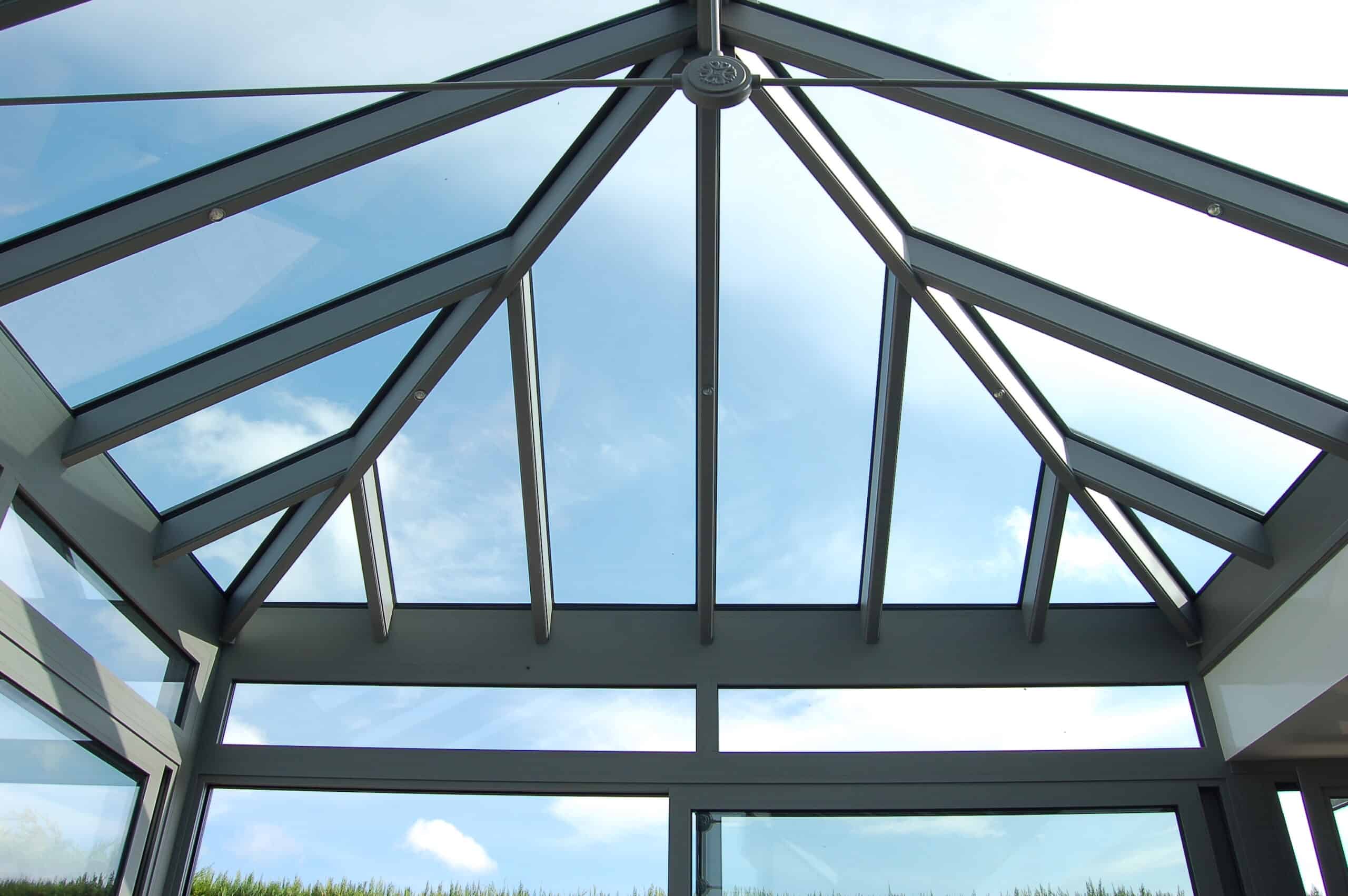 Smart Systems Aliver roof viewed from inside with roof bars and sky