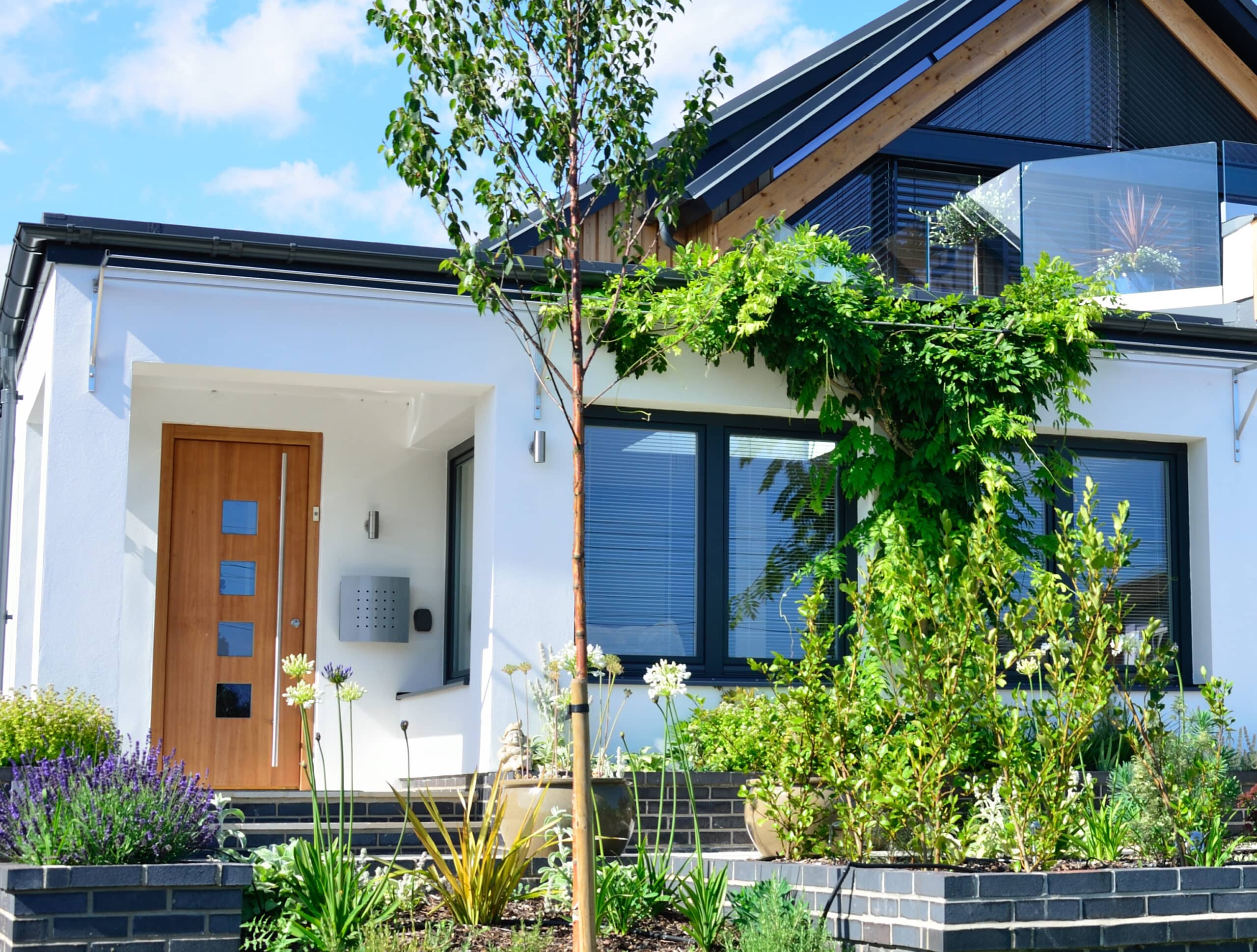 hallmark doors in a wood effect design to a house extension