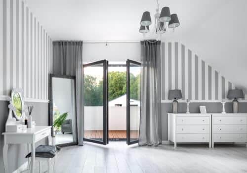 French slimline doors in a bedroom grey colour throughout