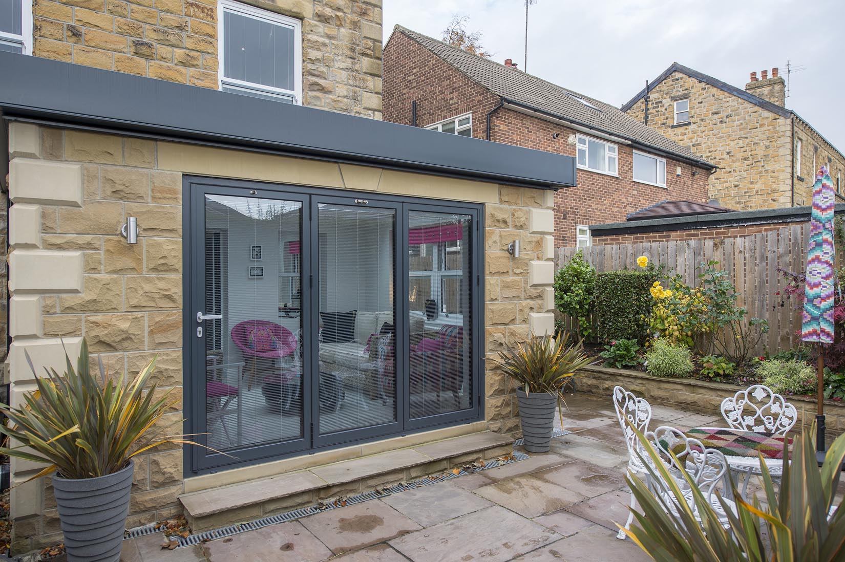 integral blinds outside view in grey bifold doors