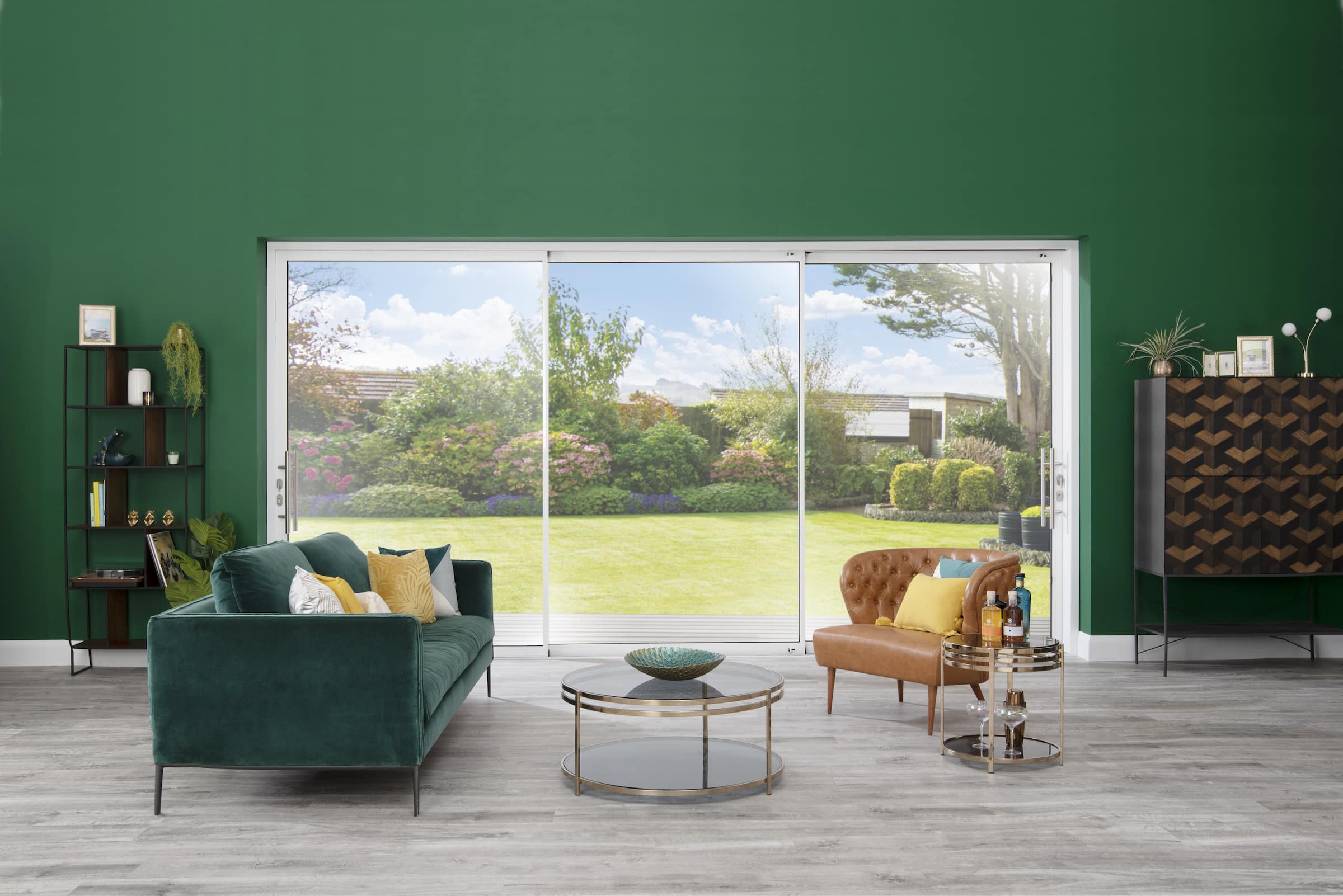 white origin sliding doors in a green decorated room