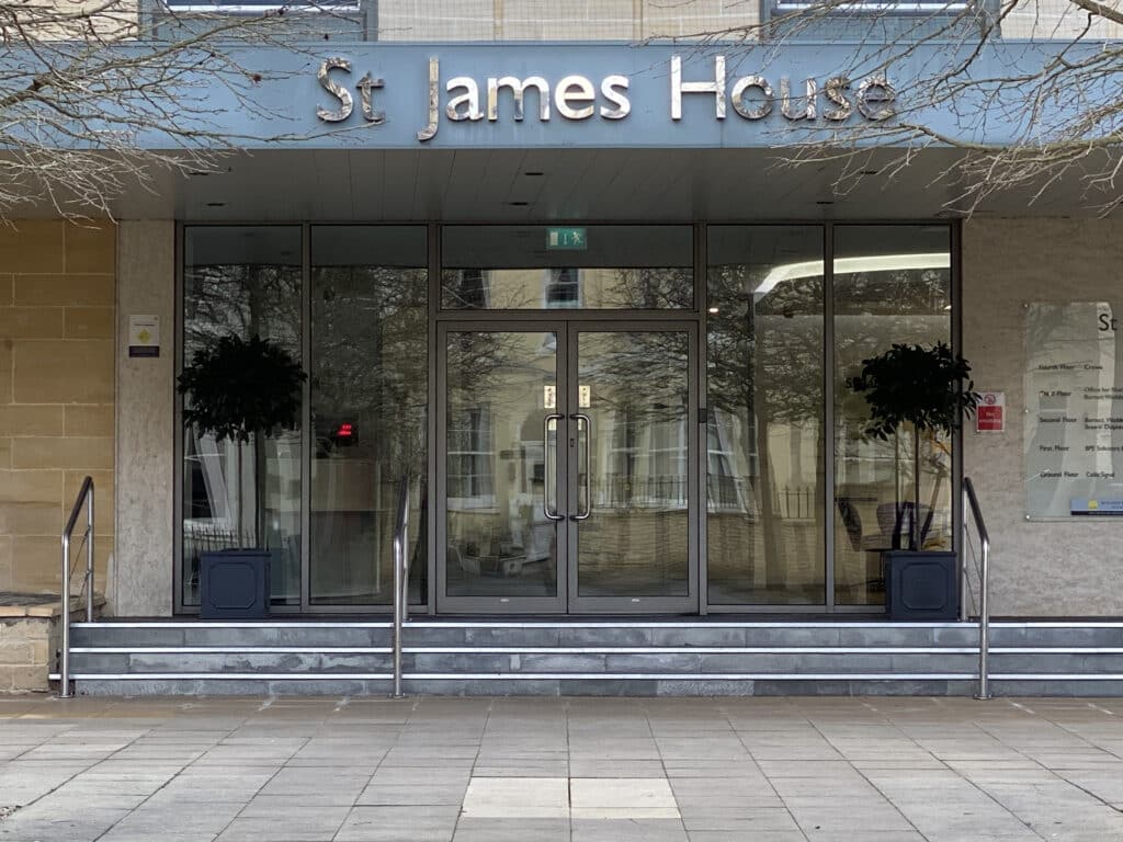 commercial aluminium doors as an entrance to an officebuilbing in a grey metallic colour 