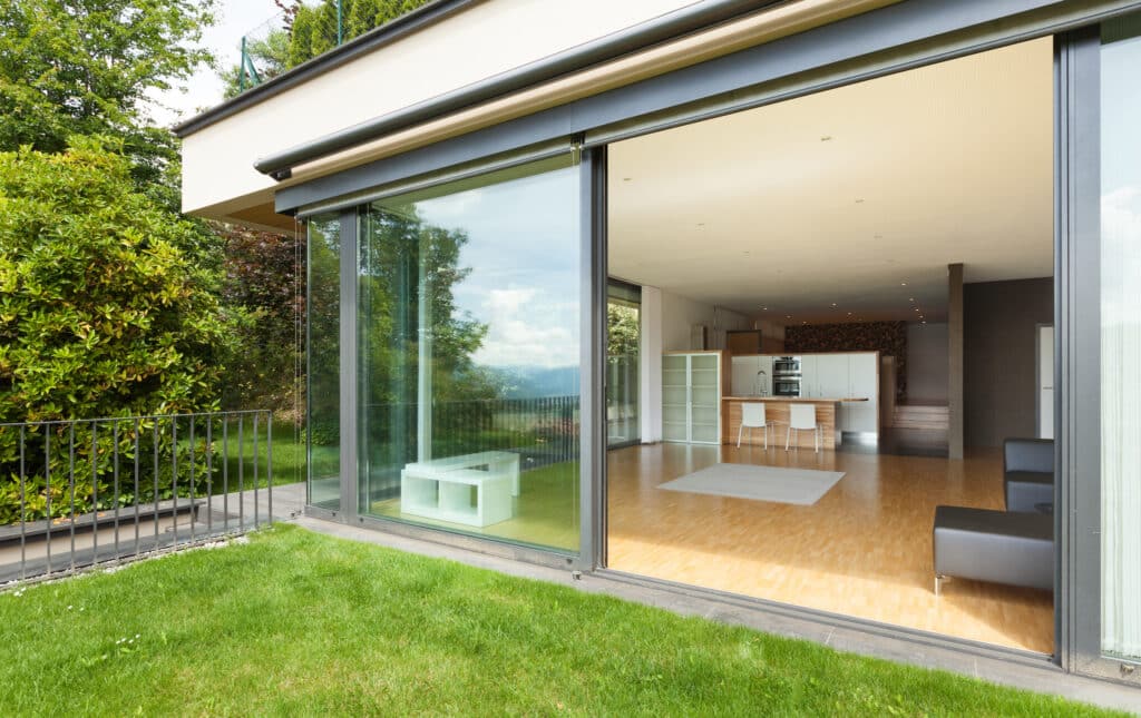 Grey open patio doors viewed from the garden