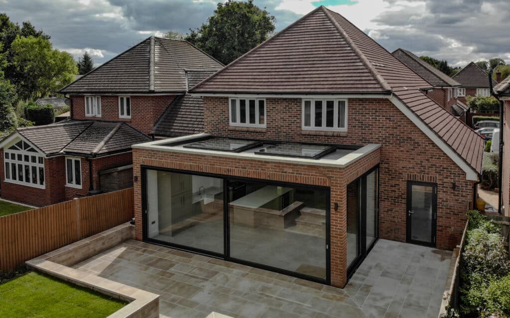 modern family home with a sliding door extension on the back