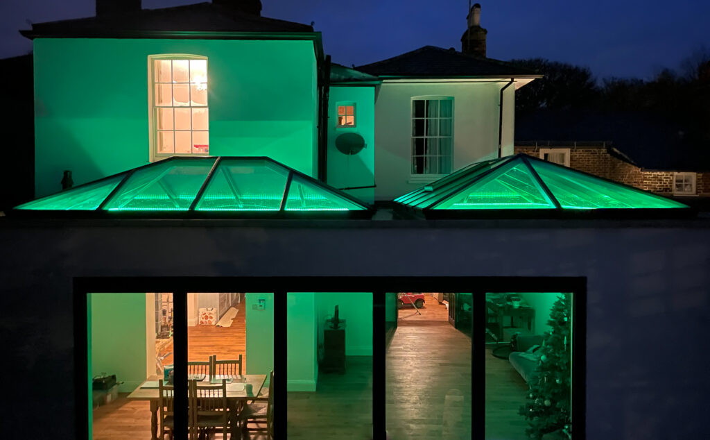 picture of lantern roofs above bifolds doors at night