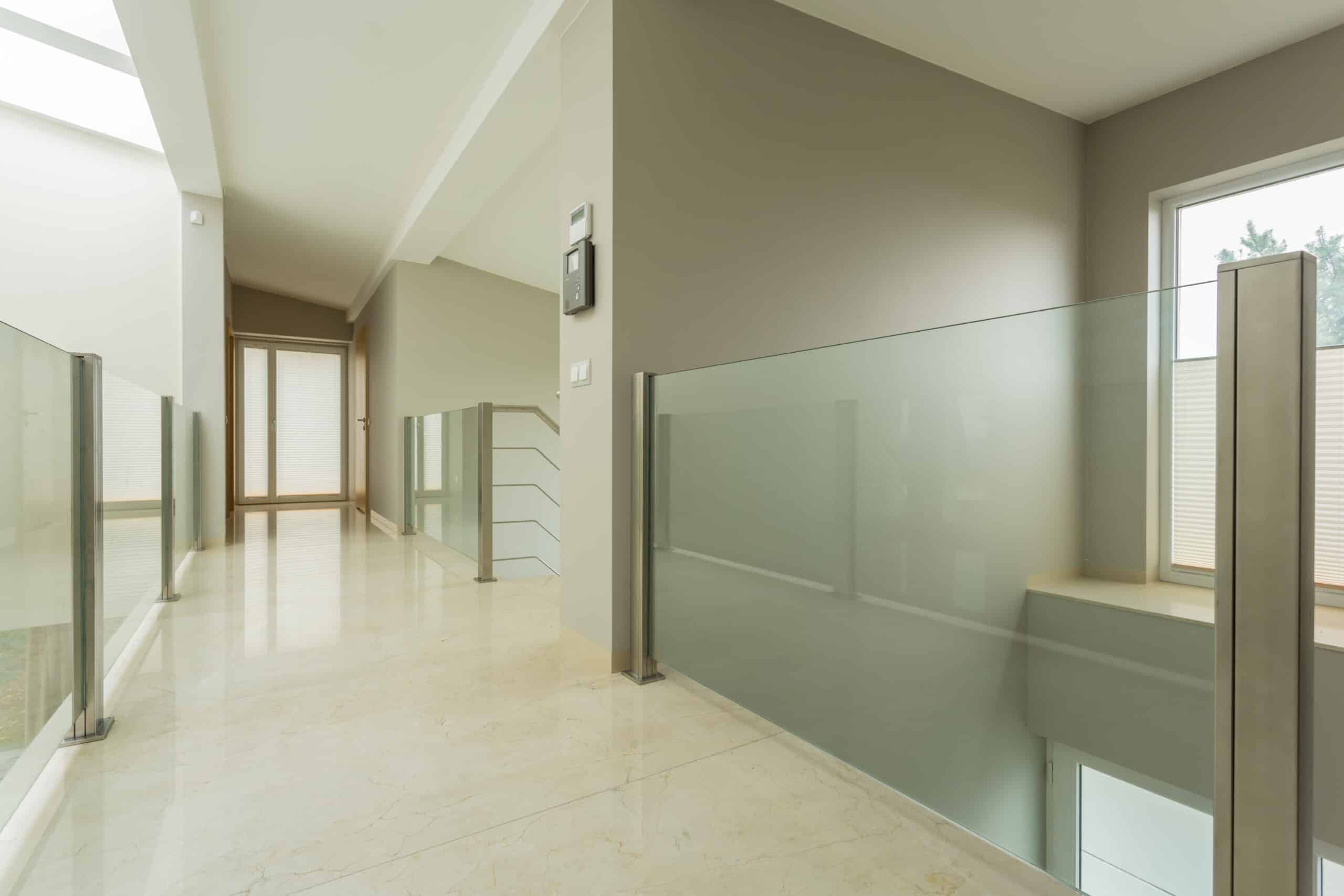 frameless glass balustrades in a modern home landing area