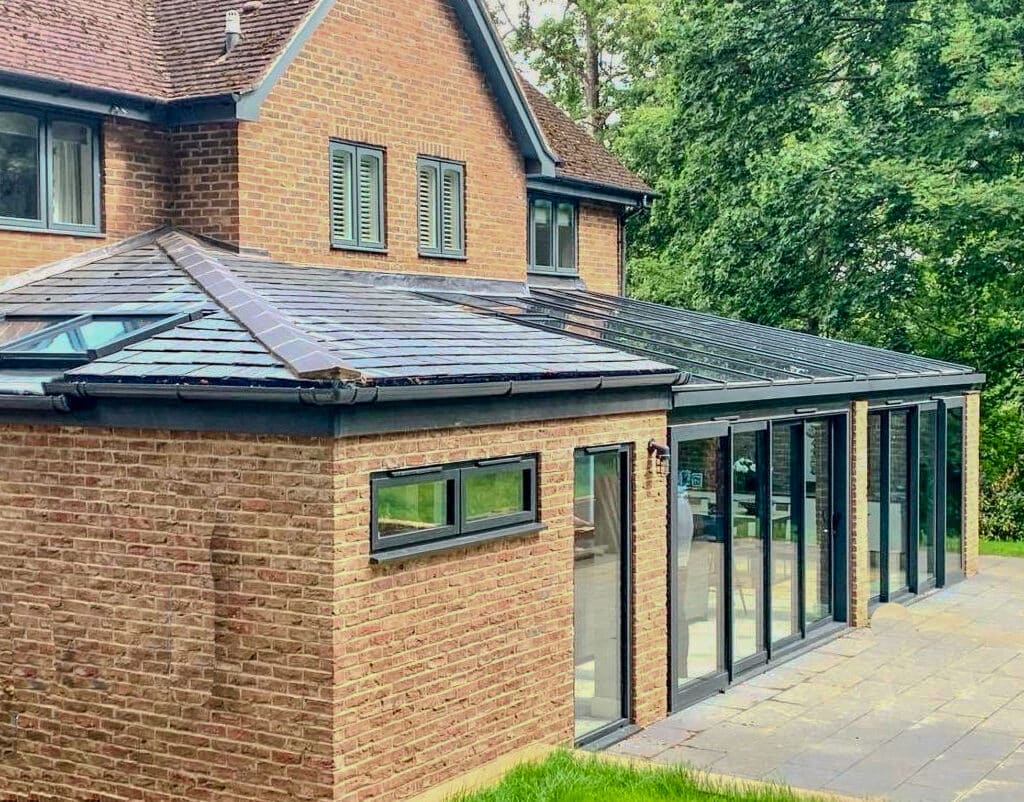 aluminium wintergarden extension in surrey house