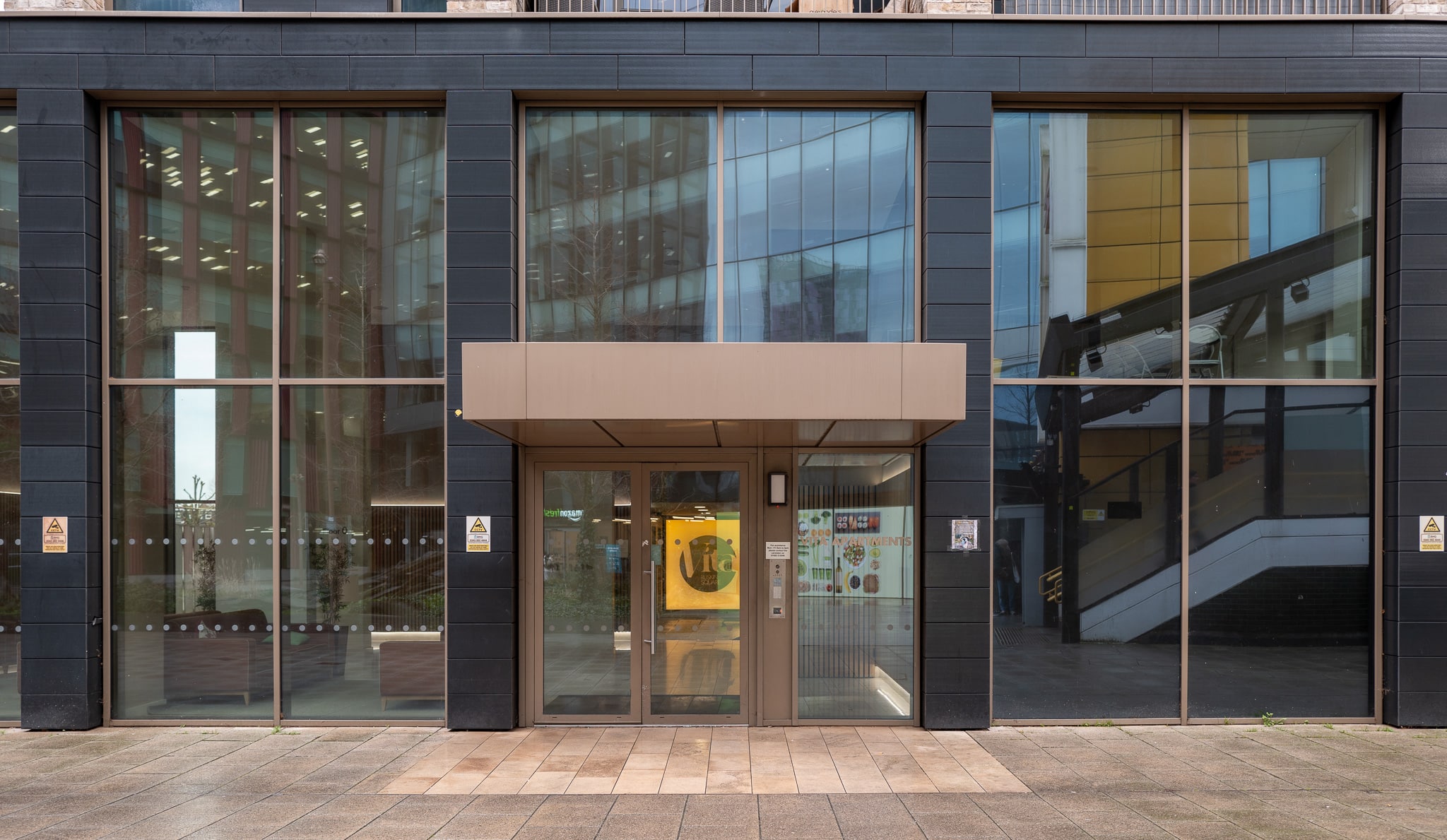 alumil m35 curtain walling gold colour in luxury apartment building