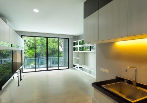 Alumil M450 sliding doors in a new kitchen vacant flat