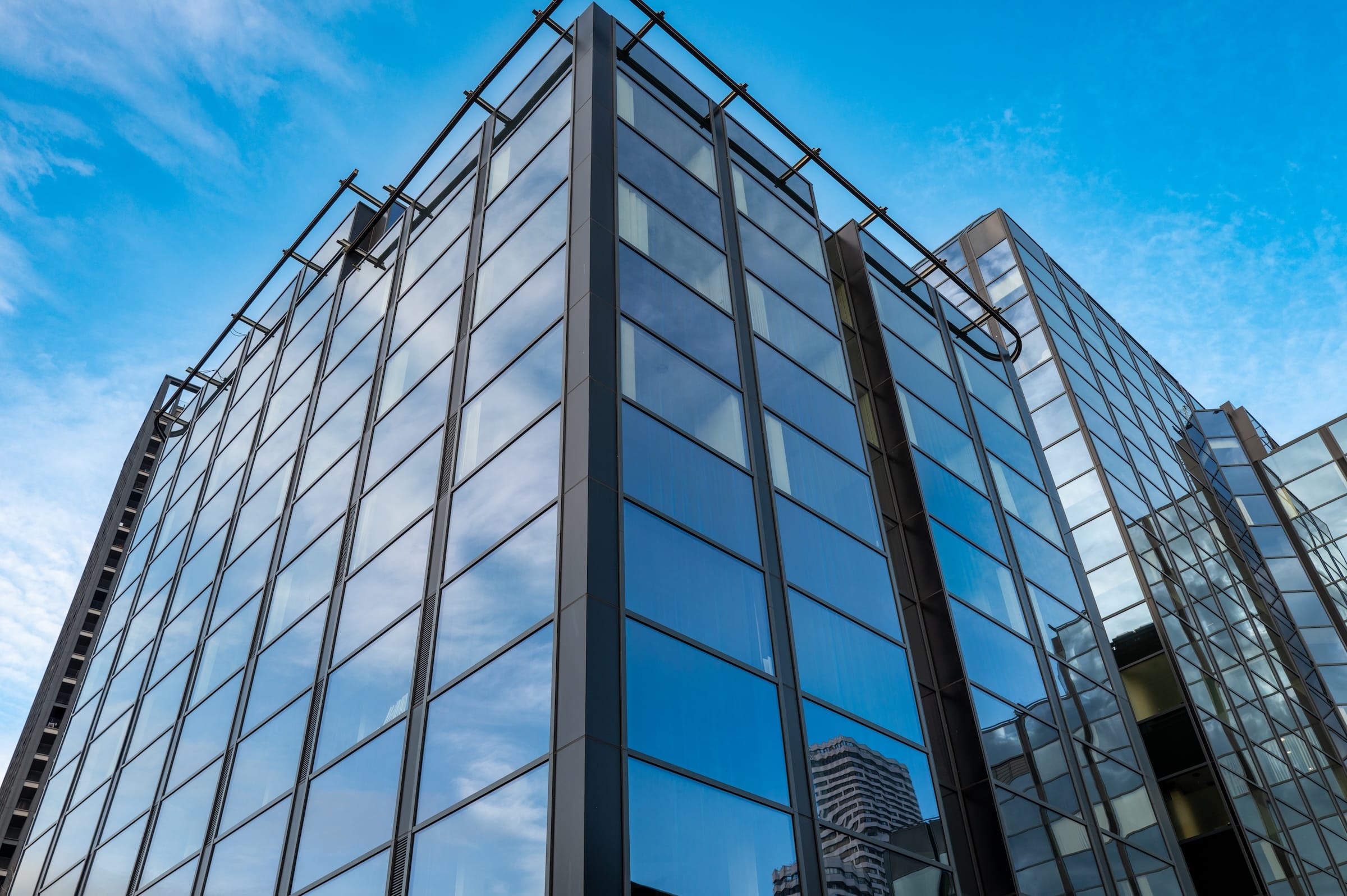 grey alumil m77 curtain walling in a new office building